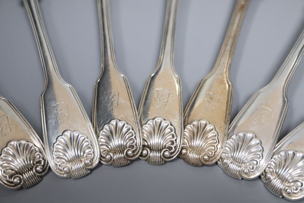 A set of eight George IV silver double struck, fiddle, thread and shell pattern table spoons, William Chawner II, London, 1824,